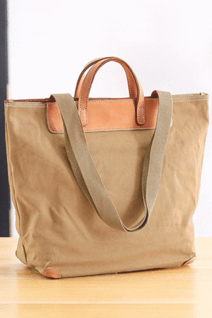 Minimalist canvas bag with leather details not only for casual wear internal zipped pocket two internal freely accessible