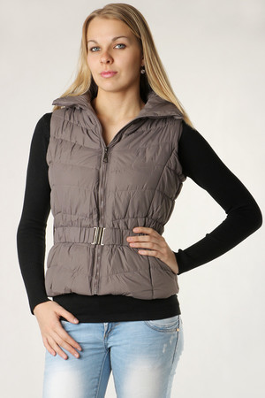 Women's sports quilted vest with zip fastening. Flexible waistband. Material: 100% polyester