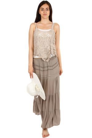 Women's lace tank top. The floral pattern adds a romantic look to the undershirt. The tank top is worn as the top of the