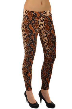 Extravagant ladies leggings with snake pattern and flint application. Material: 65% cotton, 30% polyester, 5% elastane