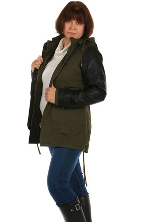 Women's jacket - parka with leatherette sleeves and hood. Zip fastening. The waist and bottom hem can be pulled with a lace.