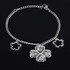 Bracelet made of surgical steel flowers and cloverleaf