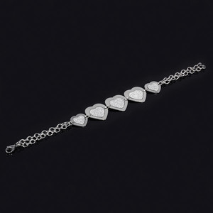 Bracelet made of surgical steel connected by heart Dimensions: big heart 21 x 20mm, length 21cm