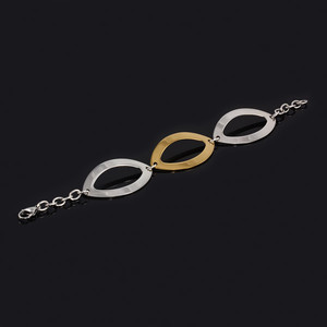 Surgical steel bracelet with mesh in silver-gold color. Dimensions: length adjustable 20-23cm, oval 50 x 27mm