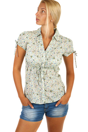 Elegant ladies blouse with floral print and ruffles. Material: 100% cotton.