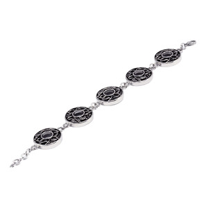 Solid steel bracelet made of circular elements. length adjustable 22-25,5cm, wheel diameter 27mm, thickness 5mm