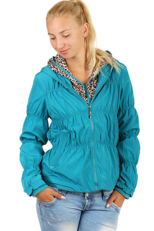 Women's quilted jacket with hood. Full-length zipper. Front pockets. Part of lining and hood with animal pattern. Suitable