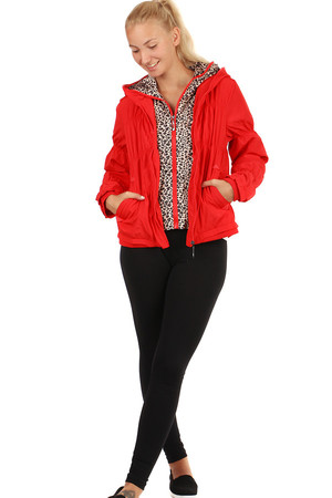 Women's quilted jacket with hood. Full-length zipper. Front pockets. Part of lining and hood with animal pattern. Suitable