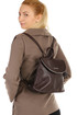 Small women's leather rucksack in the city