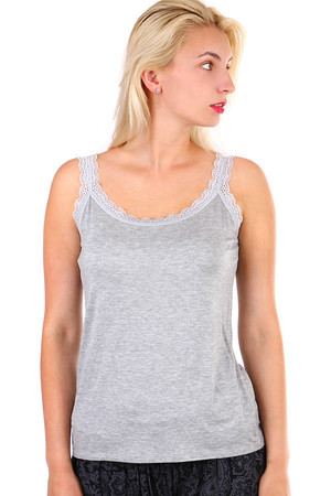 Women's elegant tank top with lace straps and neckline. Looser fit. Material: 95% viscose, 5% elastane. Import: Italy