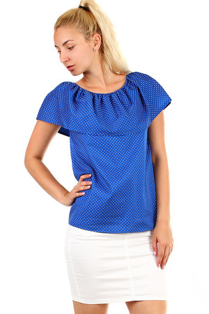 Ladies polka dot blouse with distinctive frills. The sewn-in rubber can be used to adjust the neckline. Material: 95%