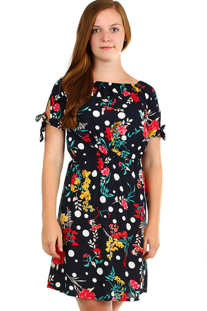 Women's short summer dress with floral pattern. Decorative binding on the sleeves, at the waist and at the neckline rubber.