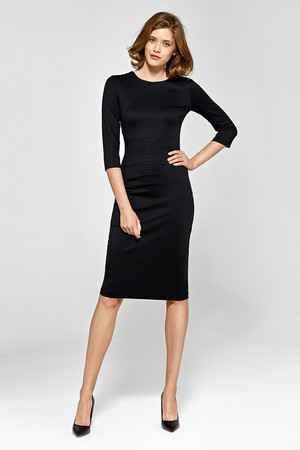 Evening women's dress with a sleeve cut to the knee, with three-quarter sleeves. Elegant dress suitable for both the office