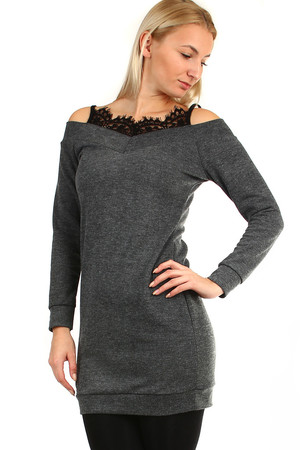 Short ladies knitted dress with long sleeves. The dress has exposed shoulders and lace in the neckline and back. Suitable for