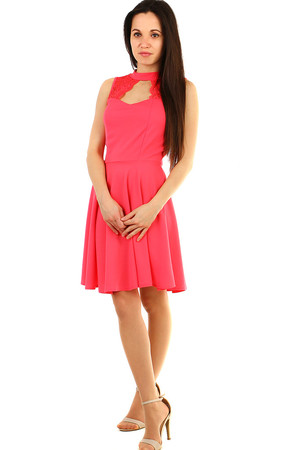 Short women's ball or formal dress with lace in the neckline and on the back. A-line cut flattering figure. The universal