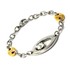 Massive surgical steel bracelet with gold-colored elements