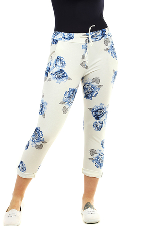 White women's 7/8 sweatpants with a pattern of flowers shortened leg length in white with colored ornament elastic waist and