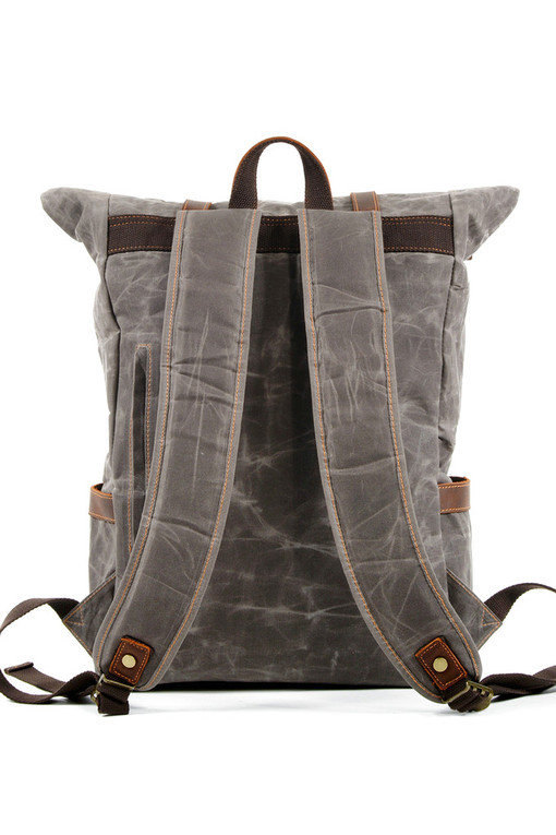 Vintage backpack made of canvas with pockets