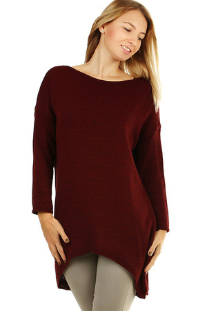 Longer women's oversized sweater with an extended back. warm material with wool content plain knit with ribbed hem the front