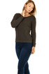 Knitted women's sweater with cuts on the back