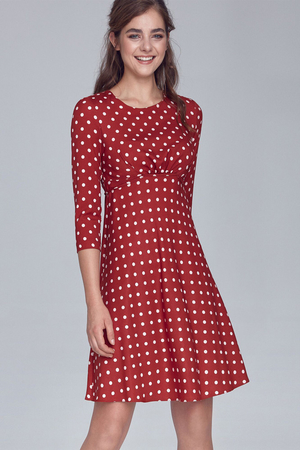 Retro formal women's knee dress with an unoriginal polka dot pattern. three-quarter sleeve round neckline A-cut skirt