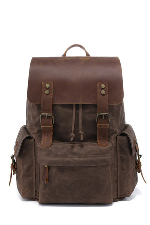 Retro backpack made of waxed canvas interior storage with lining padded tablet or notebook compartment, protected by rubber