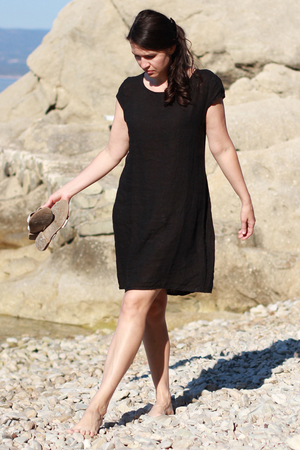 Timeless women's linen dress with pockets created for summer. one color design free air cut length above the knees boat