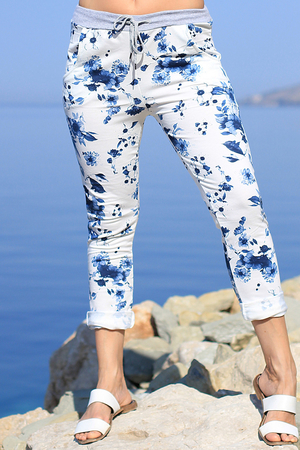 Unusual white sweatpants with a pattern of blue flowers. gray knit with drawstring to adjust the waist circumference 2