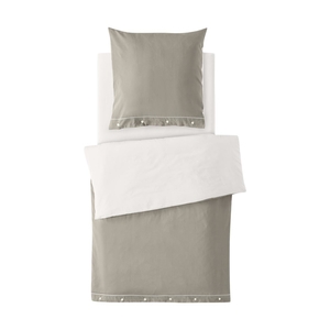 Modern organic cotton bedding with a satin structure from the German manufacturer LIVING CRAFTS. prewashing causes a matte