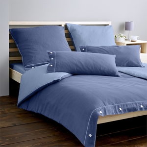 Modern organic cotton bedding with a satin structure from the German manufacturer LIVING CRAFTS. prewashing causes a matte