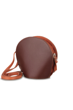 Small women's round smooth handbag made of genuine leather holding shape practical size closing with two zippers lined inside