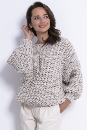 Women's sweater with a thick weave maxi cut covers shortcomings boat neckline dense bond cuffs on the sleeves low shoulder
