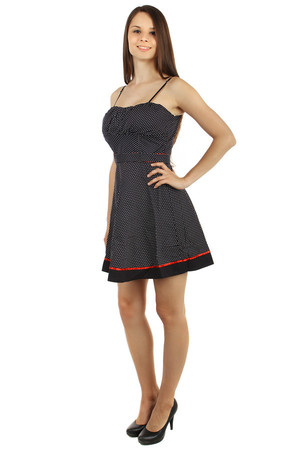 Beautiful dress with fine polka dots and sewn strap. Zip fastening at the back. Reinforced cups and adjustable shoulder