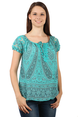 Comfortable women's blouse with unusual motif. The cut flatters the figure. Transparent lace on sleeves. Drawstring neckline.