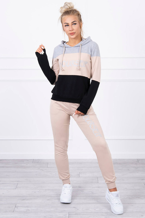 Women's cotton tracksuit set - sweatshirt and pants. hoodie in a three-color combination with long sleeves finished with