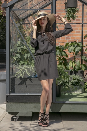 Modern ladies short dress with long sleeves desirable cut V-neckline binding at neckline 3/4 sleeves finished with elastic