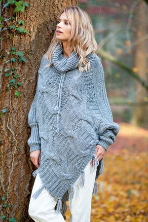 Women's original wool poncho warm ideal outerwear piece well combinable with wool and alpaca knitted long sleeves decorated
