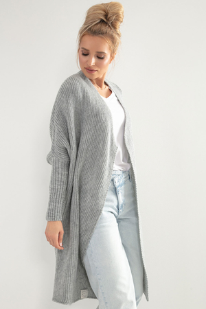 Long knitted women's cardigan loose fit with wool pleasant and soft various colours narrower patches on sleeves dropped