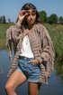 Knitted wool cardigan with fringe