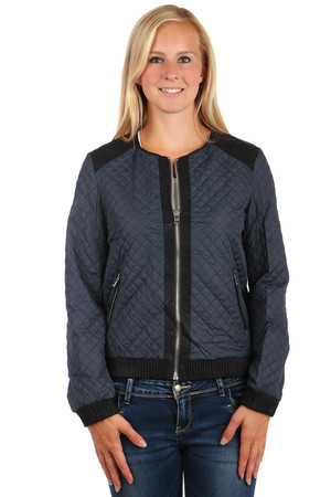 Women's quilted jacket with black trim. Zipped front pockets. Ornament on back. Zip fastening. No hood. Suitable for spring
