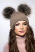 Ladies cap with furry pom-poms