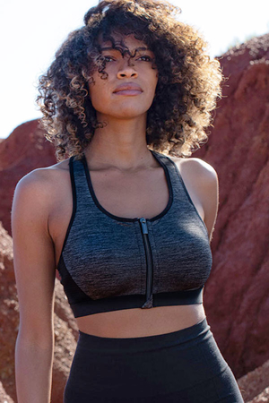 Sports bra in grey with an eye-catching zipper unfastens at the front strong straps straps joined in the middle of the back