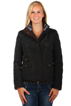 Women's quilted jacket with distinctive front pockets. Zip fasteners and patents. Zippers on the sleeves. Design without