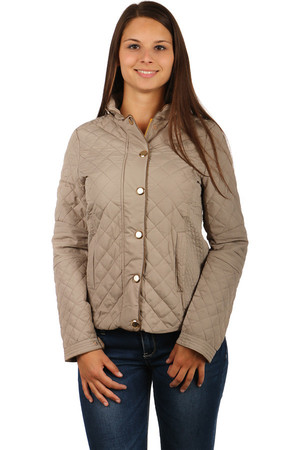 Women's quilted zippered jacket with large glossy patents. Front pockets. Zip fastening. Design without hood. Suitable for