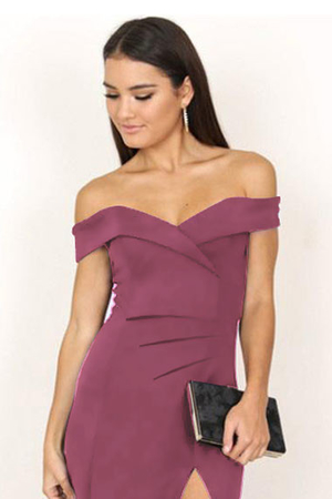 Short women's formal dress for a festive occasion. monochromatic close fit on the front part asymmetrical slit wrapped