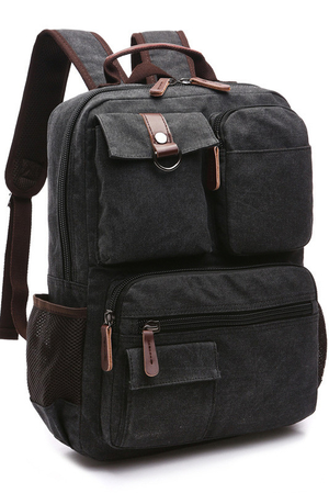 Canvas retro backpack with many pockets: 5 pockets in front for smaller items retro style leather buckle on pocket as detail