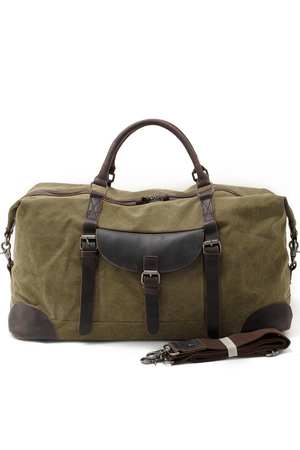 Large canvas waterproof travel bag in popular retro style not only for adventurers. lined one interior zippered pocket two