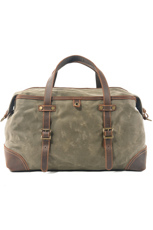Travel bag made of waterproof canvas for hand and shoulder in a pleasant retro look main part with two-way metal zipper
