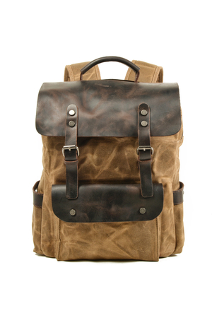 Waterproof retro canvas backpack: retro design waterproof canvas with leather accents main zippered compartment leather
