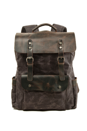 Waterproof retro canvas backpack: retro design waterproof canvas with leather accents main zippered compartment leather